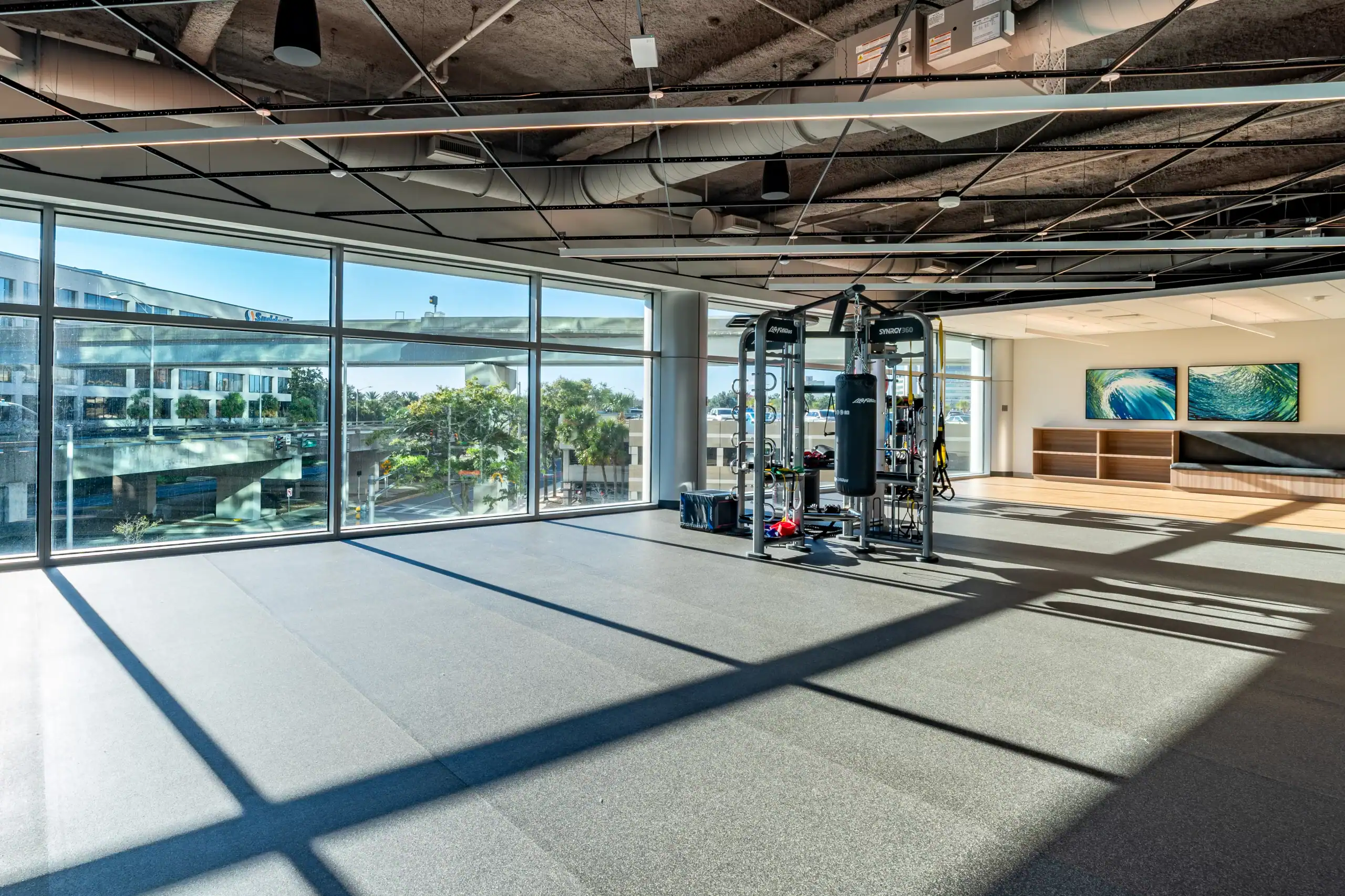 Jacksonville office building amenities at 701 San Marco including fitness center and modern tenant spaces.